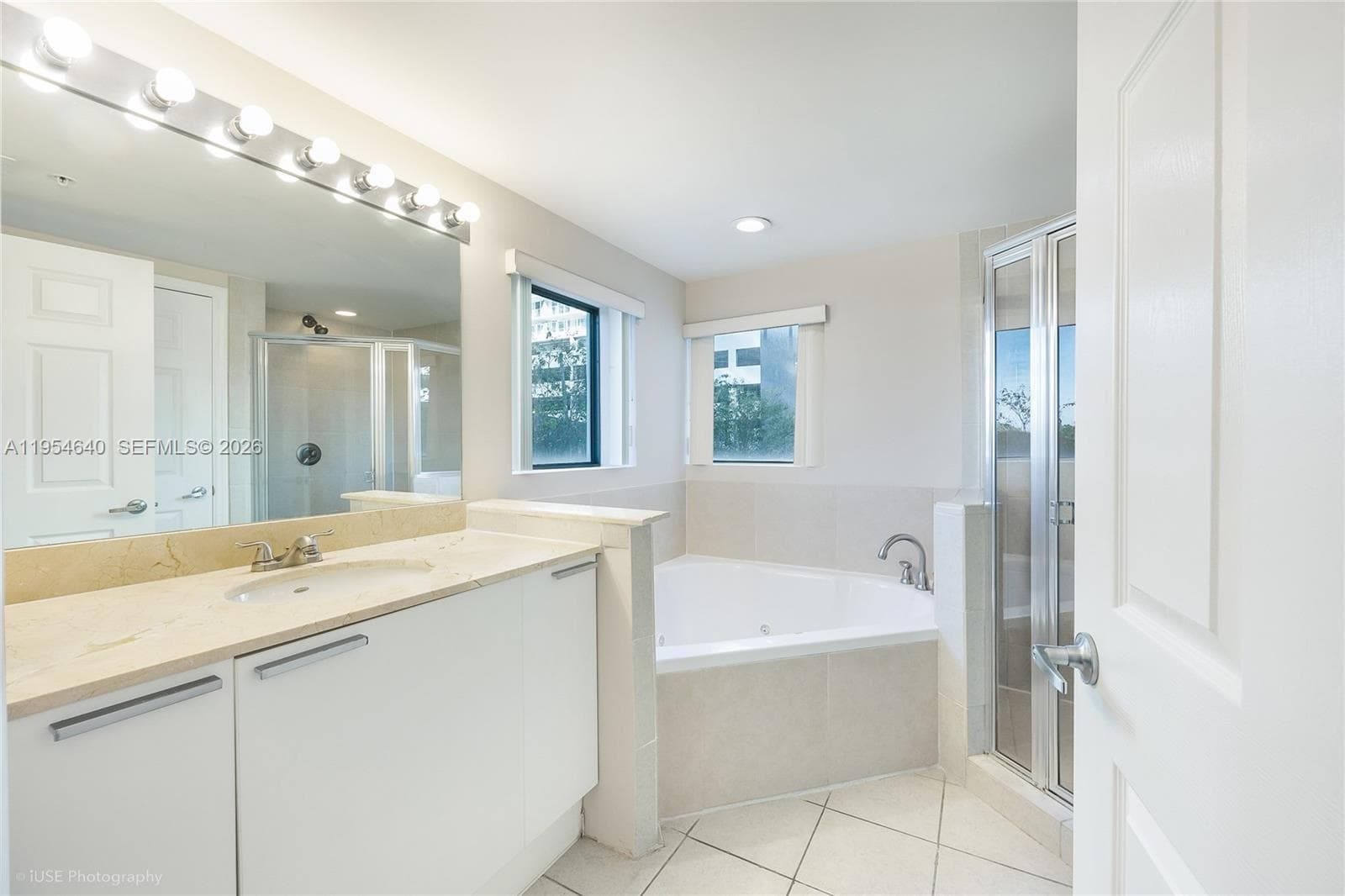 Master bathroom with windows and plenty of light