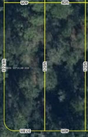 Two lots on Magnolia St and corner of Hibicus Ave.