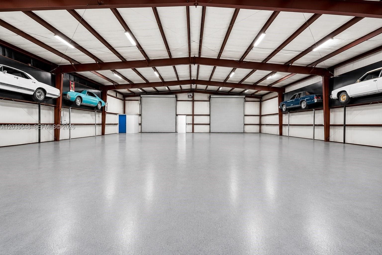 Oversized detached garage offering substantial capacity for vehicles, equipment, or workshop operations—ideal for collectors or contractors.