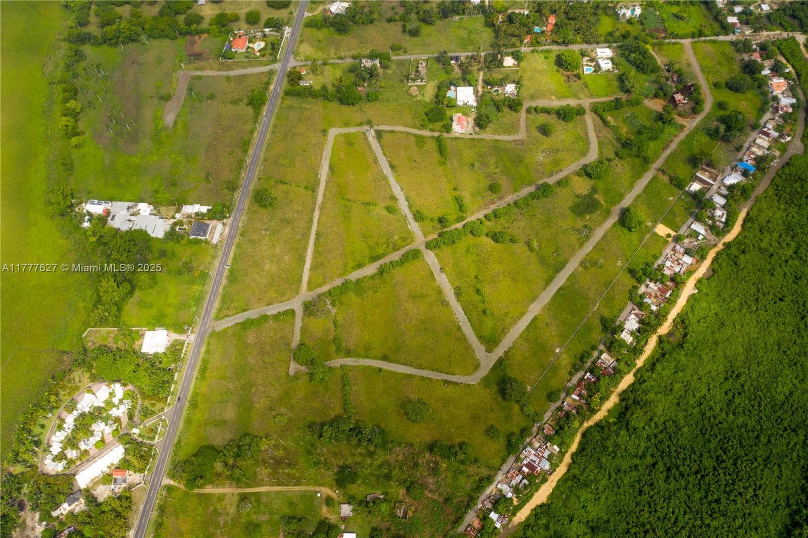 Aerial view of the vacant land available for sale.