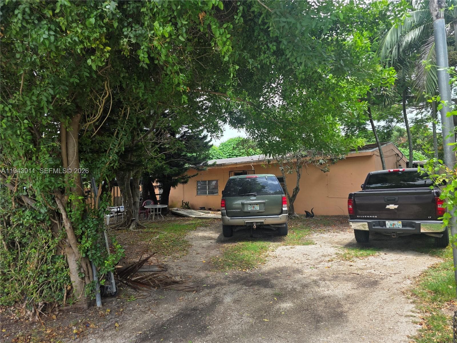 cbs home on south side of property seperate entry and fenced off from bldgs
