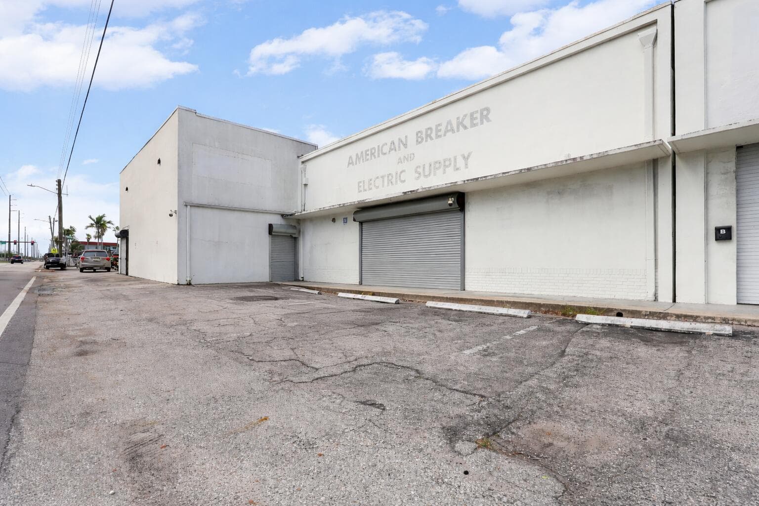 Faded industrial storefront on weathered