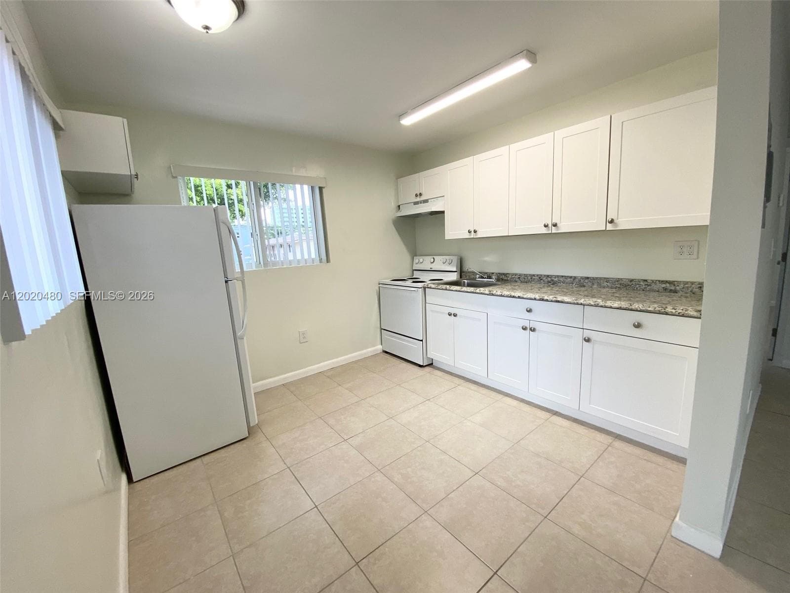 1121 NW 4 ST, Miami FL 33128