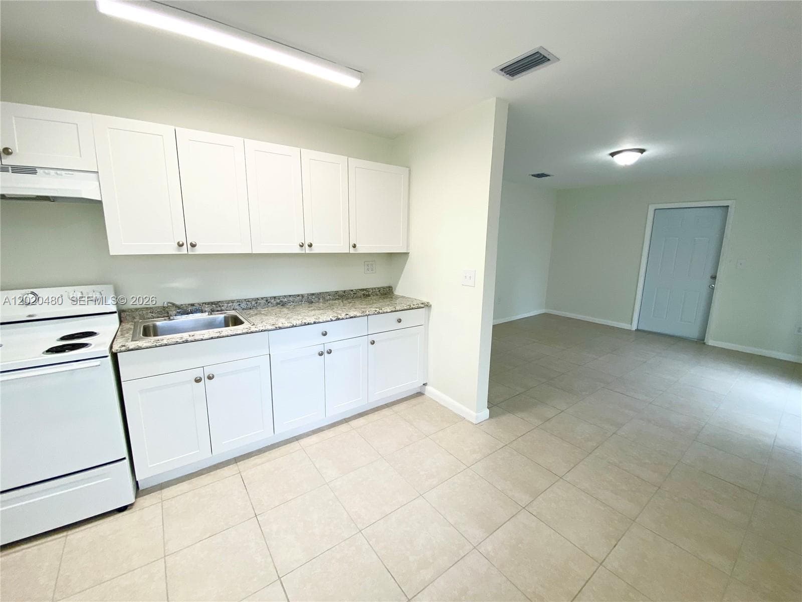 1121 NW 4 ST, Miami FL 33128