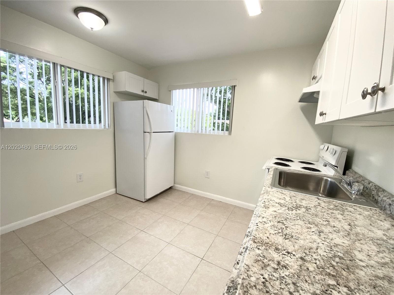 1121 NW 4 ST, Miami FL 33128