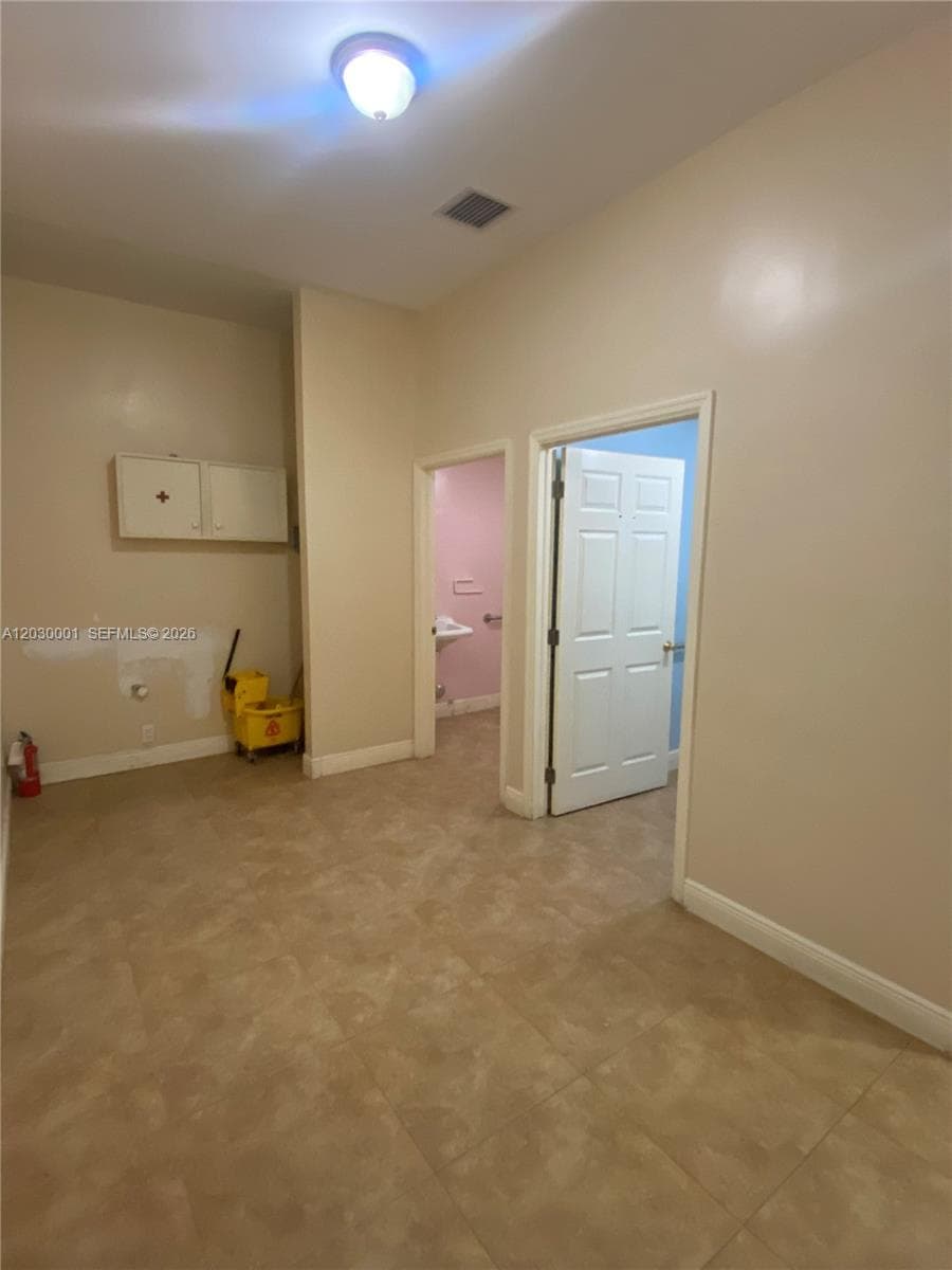 Area behind the big open space & hallway to offices