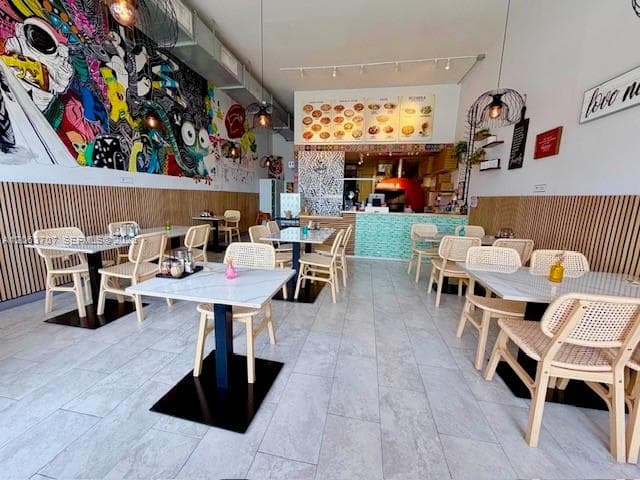 Spacius Dining Room with open layout