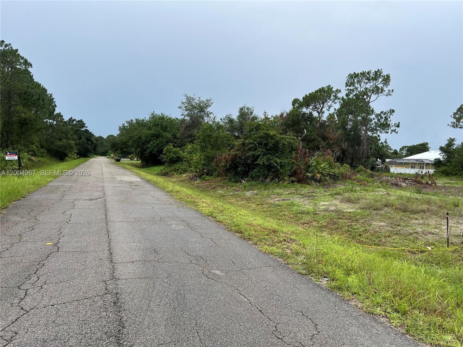 Paved road frontage with easy access in an established residential area of Lehigh Acres.