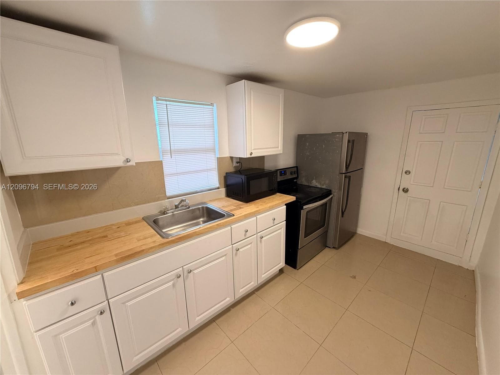 548 NW 30th St, Miami FL 33127